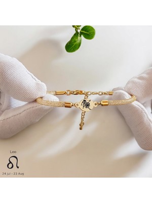 Altın Plakalı 14 Ayar Aslan Burçlarına Özel Oval Motifli Hasır Kordonlu Hediye BILEKLIK-415BURÇ