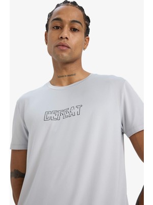 DeFacto Slim Fit Dar Kesim Bisiklet Yaka Esnek Kumaş Baskılı Sporcu Kısa Kollu Tişört E7516AX25AU