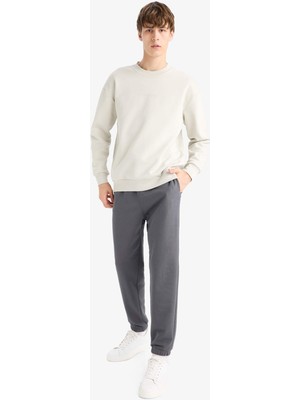 DeFacto Regular Fit Beli Bağcıklı Paçası Lastikli Cepli Basic Düz Jogger Eşofman Altı E9427AX25AU