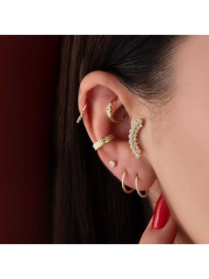On Yedi Taşlı Tragus Piercing