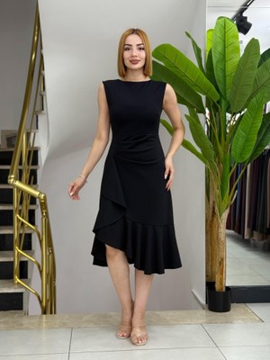 Sensuelle Kadın Sıfır Kollu Belden Büzgülü Eteği Volanlı Asimetrik Kesim Midi Janjan Krep Elbise