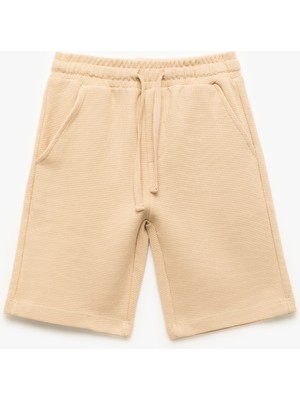 Koton Pamuklu Dokulu Cep Detaylı Beli Bağcıklı Şort