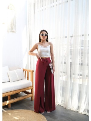 Keten Önü Çapraz Parçali Lasti̇kli̇ ve Bağcikli Geni̇ş Paça Pantolon