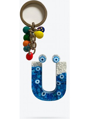 Epoksi Harf Anahtarlık – Ü Harfi, Nazar Boncuklu ve Renkli Charm Detaylı