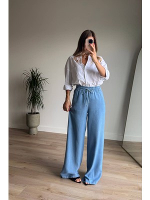 Mavi Beli Lastikli Bol Paça Salaş Model Ince Kot Pantolon