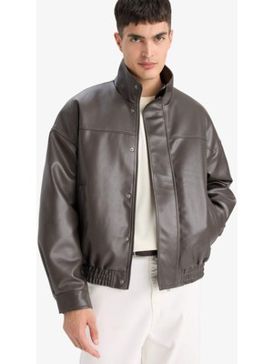 DeFacto Su İtici Oversize Fit Geniş Kalıp Dik Yaka İç Cepli Çıtçıt Kapamalı Beli Lastikli Deri Ceket Mont D2427AX25AU