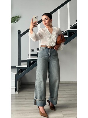 Mavi Tintli Paça Katlama Detaylı Jean