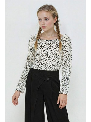 DeFacto Slim Fit Dar Kesim Çiçekli Bürümcük Uzun Kollu Tişört Kız Çocuk G2599A825AU