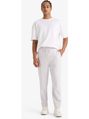 DeFacto NBA Brooklyn Nets Standart Fit Cepli Düz Paça Skuba Dalgıç Kumaş Jogger C8924AX25AU