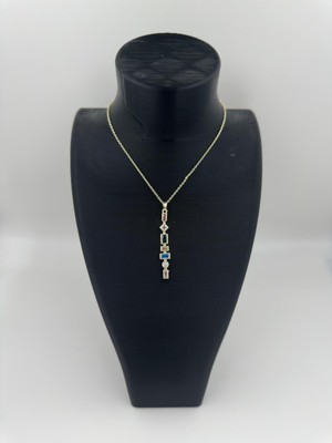 Stainless Steel Gold Renk 7 Taşlı Zarif Çelik Kolye – Işıltılı ve Şık Tasarım