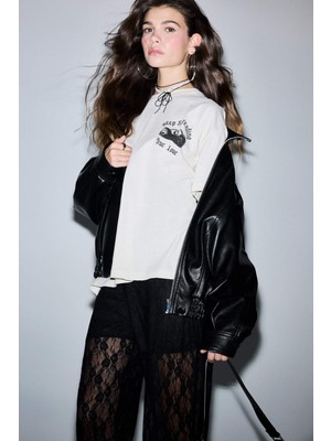 DeFacto Oversize Geniş Kalıp Bisiklet Yaka Sırt Baskılı Kısa Kollu Tişört F8749AX25AU