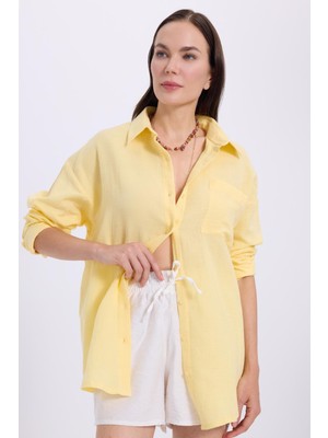 Tudors Kadın Oversize Geniş Kesim %100 Pamuk Müslin Kumaş Uzun Kollu Cepli Dokulu Sarı Gömlek