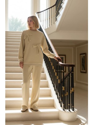 Kadın Alt Üst Oversize Fit Bisiklet Yaka Fiyonk Üç Iplik Penye Tunik Geniş Paça Pantolon Takımı