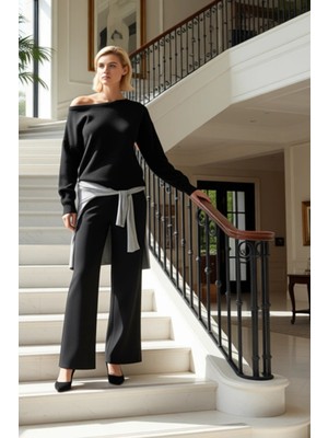 Kadınların Şıklığını Tamamlayan Kayık Yaka Triko Kazak ve Geniş Paça Pantolon Takımı Günlük