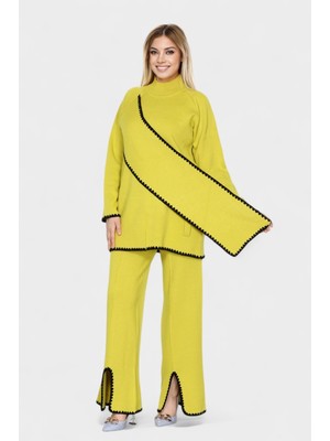 Newco Asimetrik Şerit Desenleri ve Paça Yırtmaç Detaylarıyla Modern Tasarım Triko Ikili Takım