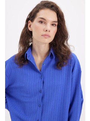 Tudors Kadın Oversize Geniş Kesim Bürümcük Pens Detaylı Uzun Kollu Dokulu Saks Mavi Gömlek