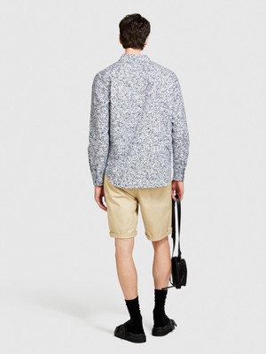 Sisley Streç Pamuklu Kumaştan Kemer Delikli Kıvrık Paça Kısa Şort Erkek Bej Şort - 324P4TEQS900Z