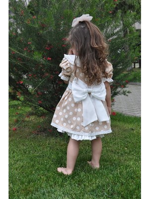 ministok Puantiyeli Bebe Yakalı Arkası Fiyonklu Kız Çocuk Elbise