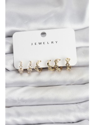 Claris Gold Renk Pirinç Yıldız Modelli Kadın Küpe Seti
