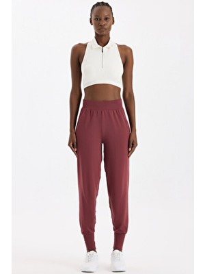 Comeup Kadın Cepli Dikişsiz Jogger Pantolon Nefes Alabilen Poliamid Kumaş Spor Kullanım İçin Bordo