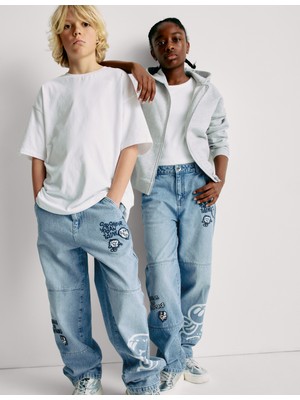 Marks & Spencer ​The Doodle Boy:trade_mark: Saf Pamuklu Rahat Kesim Sloganlı Kot Pantolon (4-16 Yaş)​