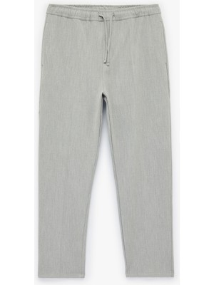 Koton Regular Fit Cepli Beli Bağcıklı Kumaş Pantolon
