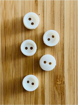 öztürk Üstten Dikmeli Krem Bebe Düğmesi. 5X11MM .çanak.