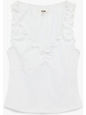 Koton Bürümcük Kumaş V Yaka Fiyonklu Fırfırlı Kolsuz Bluz