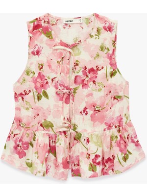 Koton Kolsuz Önden Bağlama Detaylı Peplum Kesim Çiçekli Fırfırlı Bluz