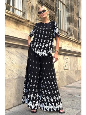 Keyifli Moda Siyah Balık Desenli Kayık Yaka Beli Lastikli Cepli Bol Paça Ikili Takım