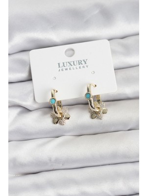 Net Damla Mavi Taş Detaylı Pirinç Gold Renk Kadın Göçmen Küpesi - Lisinya