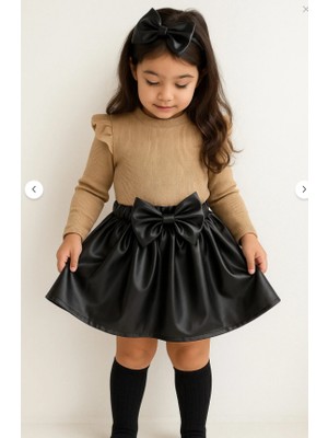 Özge Başaran Kız Bebek ve Kız Çocuk Için Deri Etek Omuz Fırfırlı Sütlükahve Badi Siyah Fiyonklu Çorap Seti