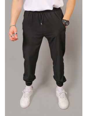 Influyente Eydamoon Erkek Siyah Baggy Tarz Paraşüt Kumaş Paça Lastikli Kompak Eşofman Altı