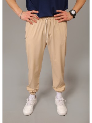 Eydamoon Erkek Bej Paraşüt Kumaş Regular Fit Paça Lastikli Cep Fermuarlı Eşofman Altı