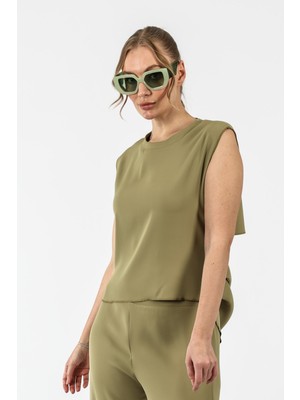 By Özlem Yazan Lamarca Bel Drape Detaylı Dekolteli Kolsuz Dokuma Kadın Bluz