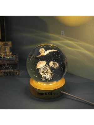 Hediyesahibi Işıklı Ahşap Kaideli Deniz Anası Temalı Cam Küre 8cm*6cm