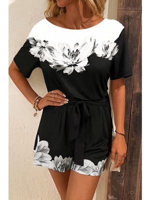 Stelol Kadın Tek Omuzu Açık Çiçek Desenli Beli Kuşaklı Iki Iplik Mini Short Tulum