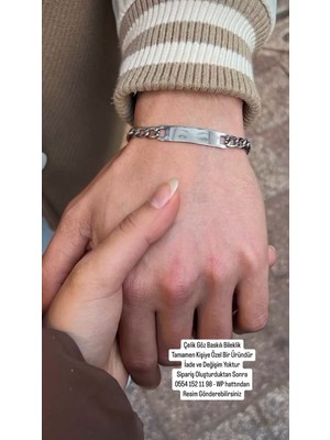 Normadia Şık Çelik Göz Baskılı Bileklik ile Tarzınızı Yansıtın