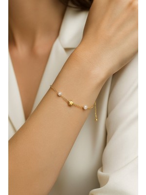 Normadia Altın Renk Yıldız Inci Çelik Bileklik, Şık ve Zarif Takı Tasarımı