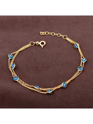 Normadia Şık Altın Yaldızlı Nazar Boncuklu Üç Sıralı Gümüş Bileklik