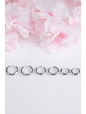 Normadia Şık Kadın Çelik Renkli Parlak Atmaz Küpe, Modern Takı Tasarımı