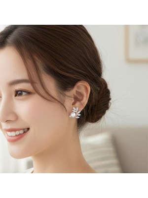 Normadia Inci ve Yaprak Detaylı Anti-Alerjik Çelik Küpe, Şık ve Zarif Tasarım