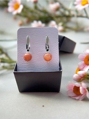 Normadia Parlak Güneş Taşlı 925 Ayar Gümüş Küpe, Şıklık ve Zarafet Için Ideal