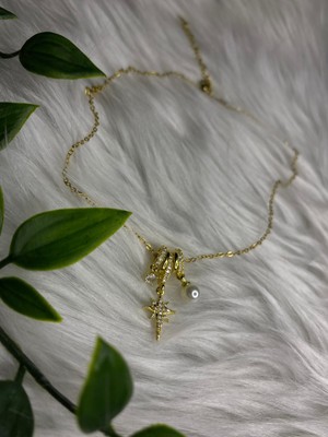 Normadia Parlak Altın Tonlarında Yıldız Detaylı Şık Kolye