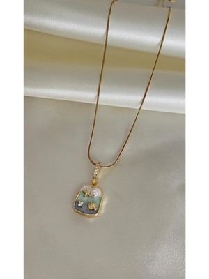 Normadia Zirkon Taşlı Deniz Yıldızı ve Istiridye Figürlü Şık Tasarım Kolye