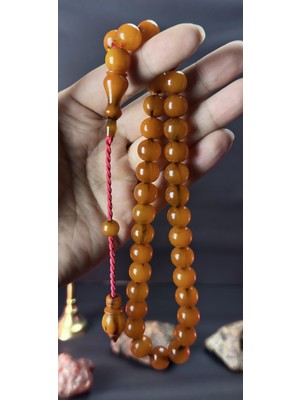 Kehribarkolik Osmanlı Sıkma Tesbihten Tıraş  12*12,5mm. 51,5gr. Diyarbakırlı Mehmet Aydın