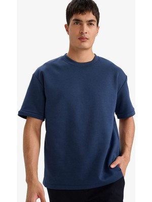 DeFacto Kırışmaz Oversize Bisiklet Yaka Basic Kısa Kollu Tişört B6494AX26SP