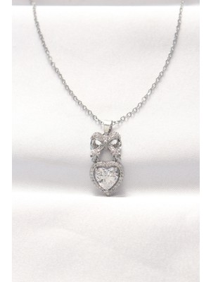 Nuveden Ieg™ 316L Çelik Silver Renk Zirkon Taşlı Kalpli Fiyonk Kolye NVDN-RSBJT34