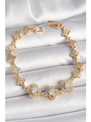 Shoplet Buğz Pirinç Gold Renk Zirkon Taşlı Yonca Model Kadın Bileklik
