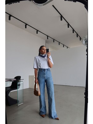 Özge Özgenç Taşlamalı Paçası Yırtmaçlı Straight Fit Jean